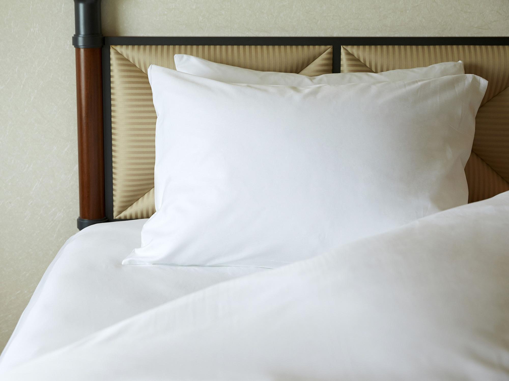 Miyako Hotel Gifu Nagaragawa Εξωτερικό φωτογραφία A pillow on a bed